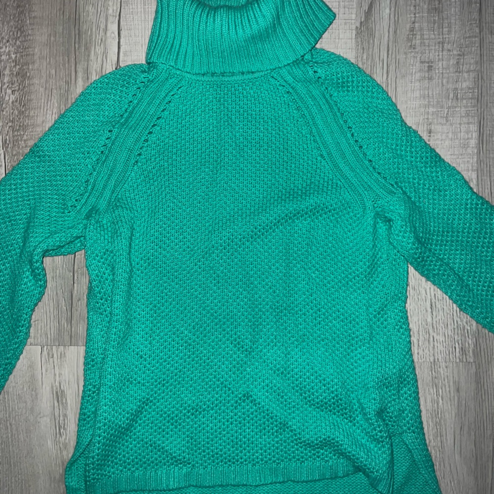 Green turtleneck sweater